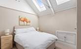 Bedroom Two's high ceilings give it a wonderful light and airy feel. - Thumbnail Image