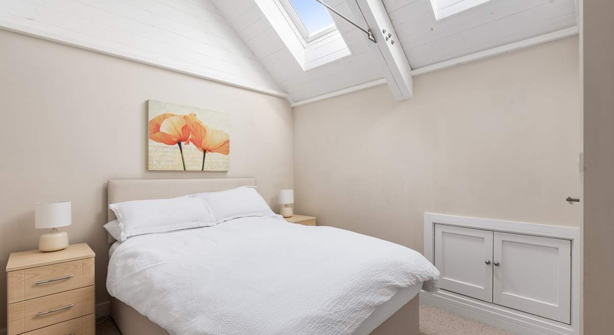 Bedroom Two's high ceilings give it a wonderful light and airy feel.