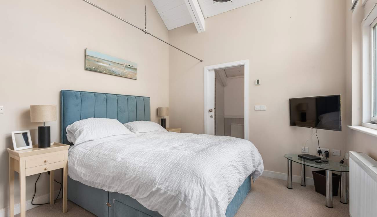 Bedroom 1 comes equipped with a lavish king-size bed, TV and an excellent en suite.