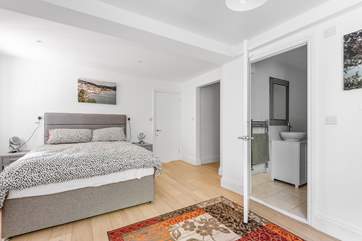 Bedroom 3 has an en-suite bathroom.