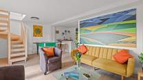 Down the staircase, you will find a fabulous second living space.