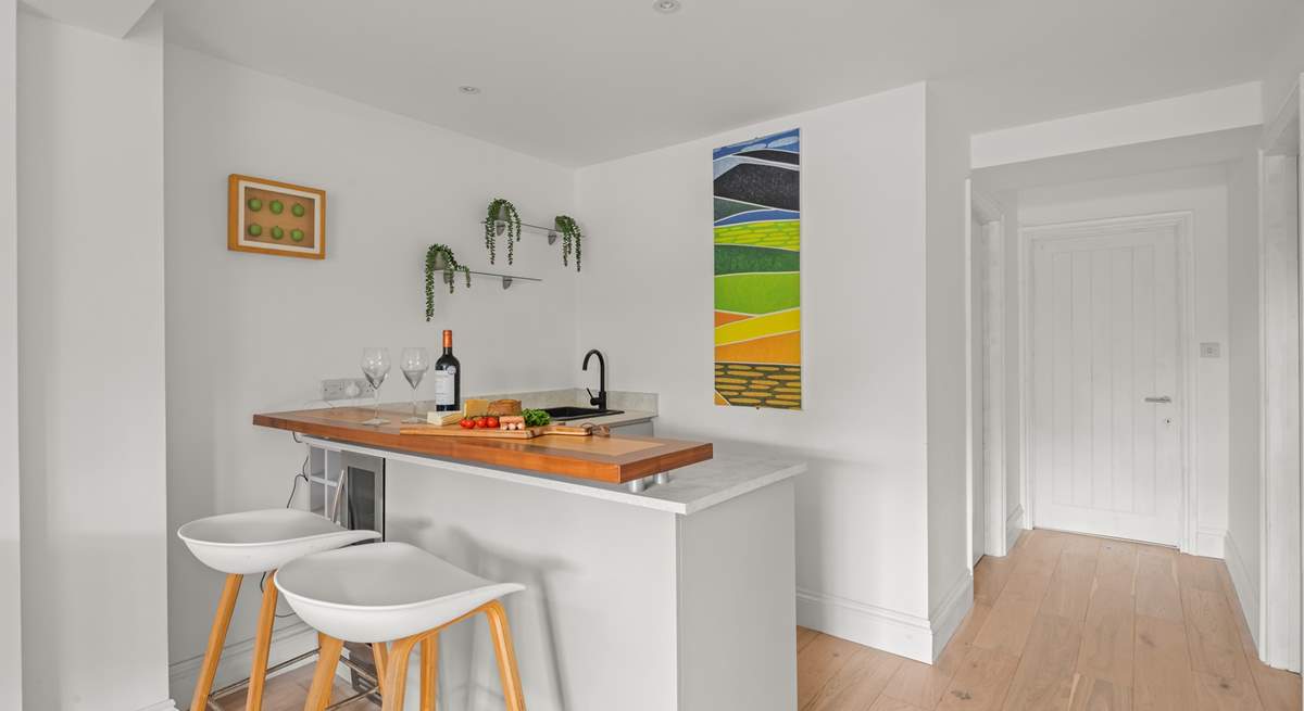 No need to head upstairs for another bottle of wine. Downstairs you will find the Summer Kitchen equipped with a fridge, sink and that all important wine fridge!