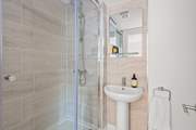 The en suite shower-room to bedroom 4.