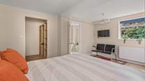 Bedroom 3 has a walk-in wardrobe and an en-suite bathroom.