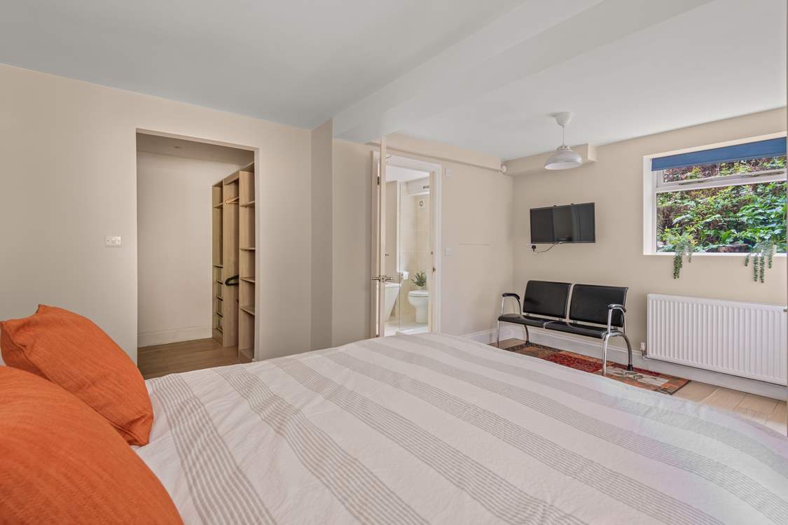 Bedroom 3 has a walk-in wardrobe and an en-suite bathroom.