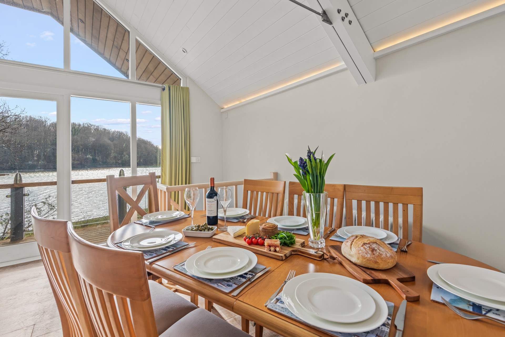 Gaze out of the window while enjoying delicious meals on the lovely dining table.