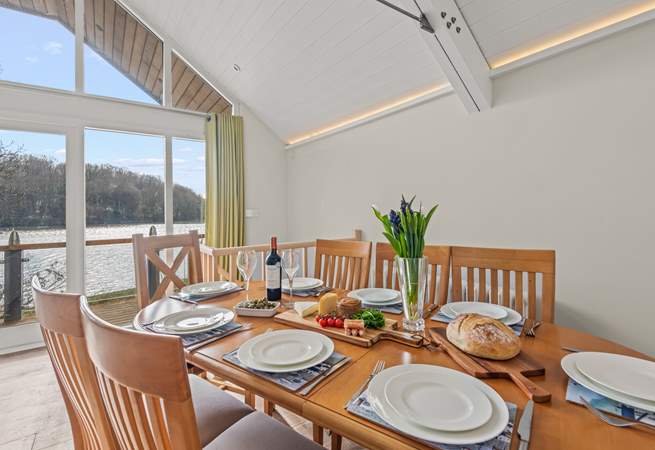 Gaze out of the window while enjoying delicious meals on the lovely dining table.