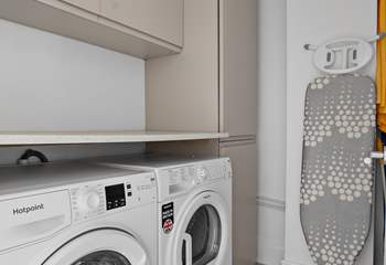 A handy utility room can be found on the lower ground floor.