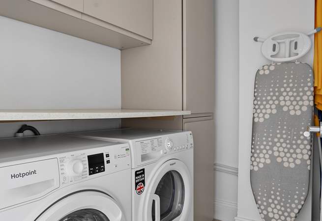 A handy utility room can be found on the lower ground floor.