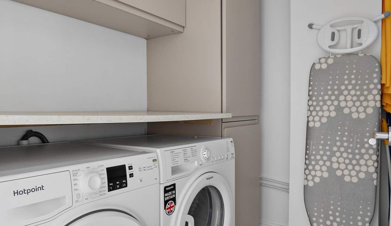 A handy utility room can be found on the lower ground floor.