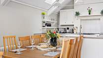 Gather round the dining-table for a delicious holiday meal.