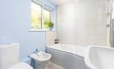 The en suite bathroom to bedroom 2, the ideal place for a long soak after a busy day. - Thumbnail Image