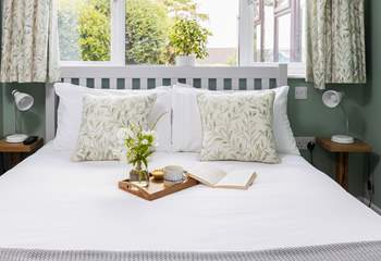 Bedroom 1 is beautifully furnished with luxury linens.