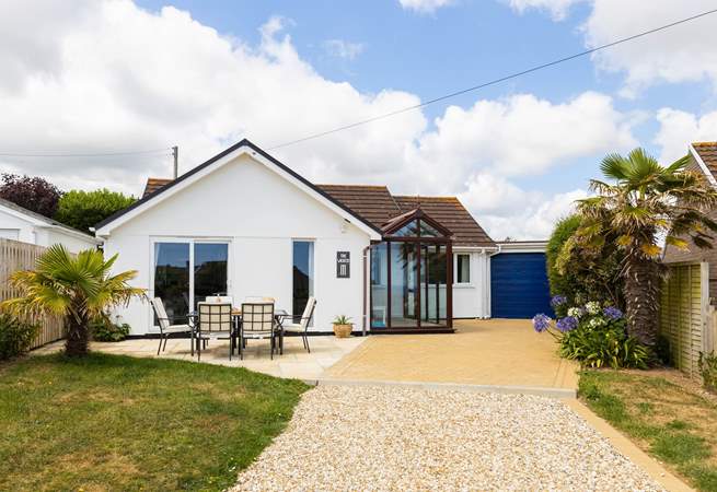 The Wickets sits at the head of a quiet cul-de-sac. Please note there is one step from the gravelled drive to the paved area.