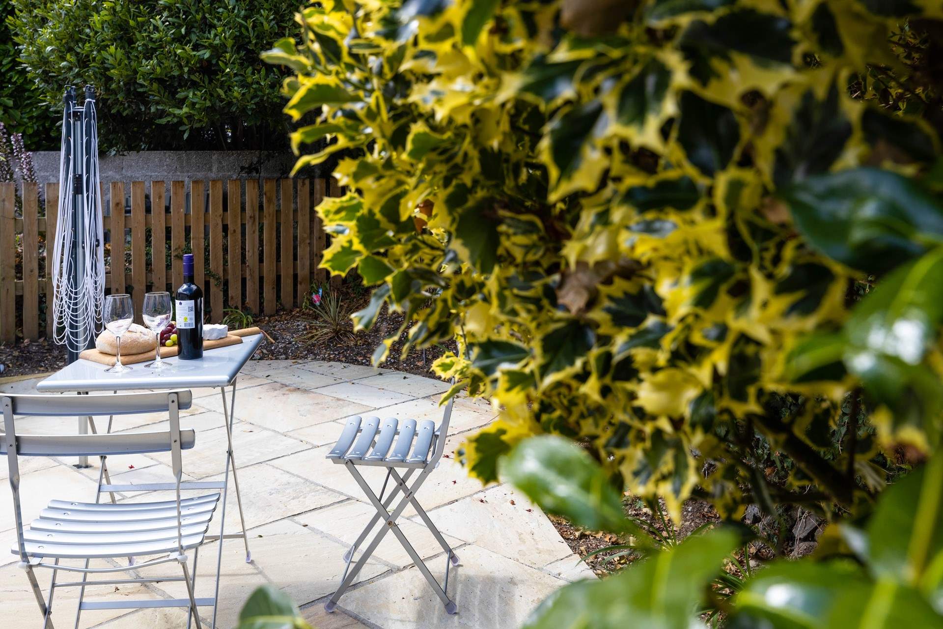 There's a secluded patio at the rear of The Wickets with a bistro table and chairs.