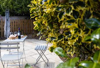 There's a secluded patio at the rear of The Wickets with a bistro table and chairs.