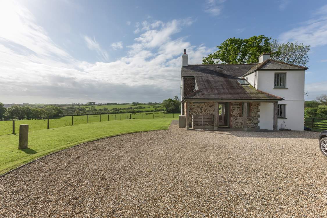 There is ample parking at the rear of the house for four cars.