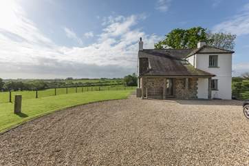 There is ample parking at the rear of the house for four cars.