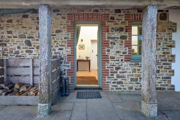 Enter through the wonderful front door.