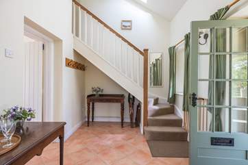 A delightful entrance hall welcomes you.