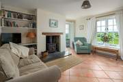 Relax and unwind in the charming living space.
