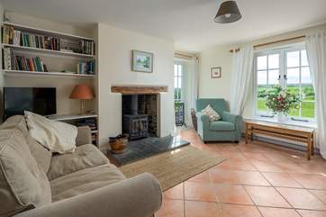 Relax and unwind in the charming living space.