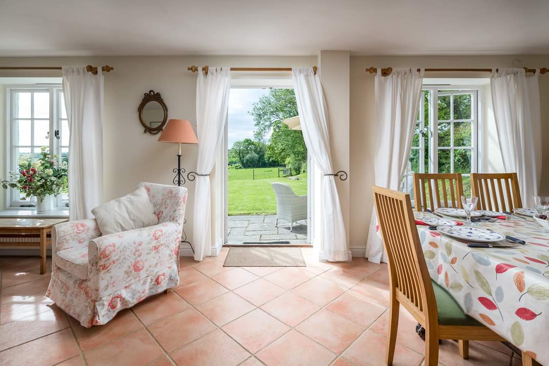 A back door leads from the open plan sitting/dining-room to the excellent garden.