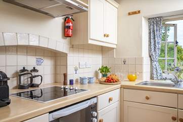 The homely kitchen has everything you'll need.