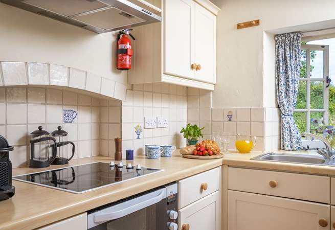 The homely kitchen has everything you'll need.