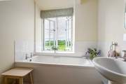 Run yourself a bath and gaze out towards the beautiful surrounding countryside.