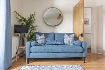The comfy sofas are great to relax on at the end of the day.