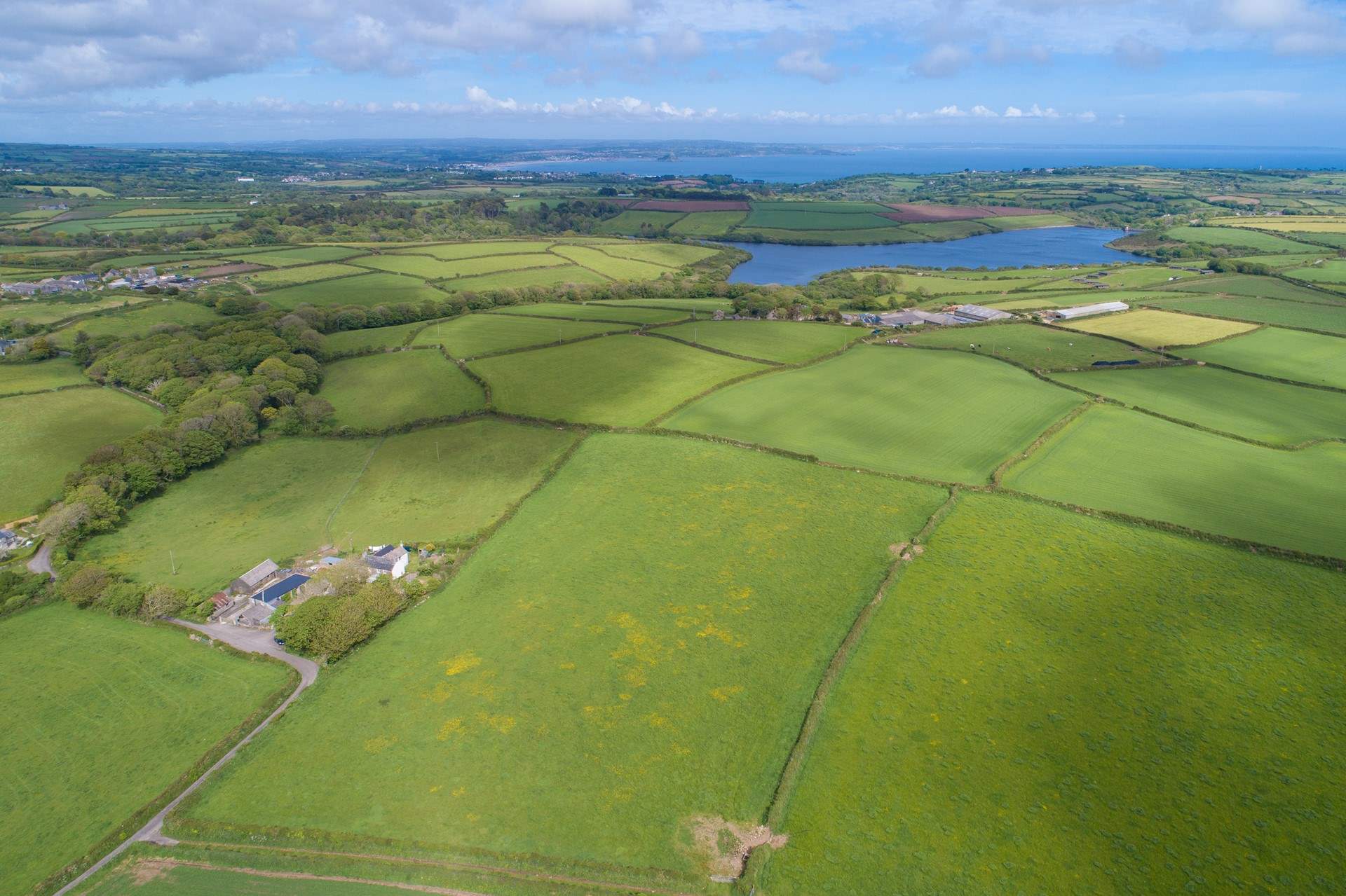 The cottage is perched in some beautiful countryside.