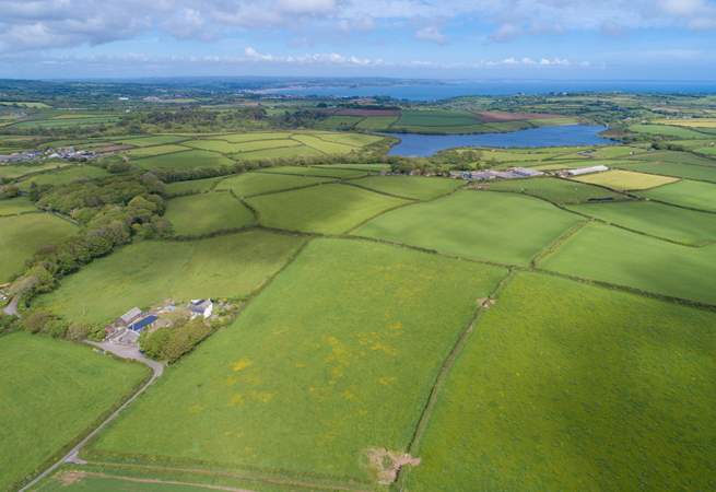 The cottage is perched in some beautiful countryside.