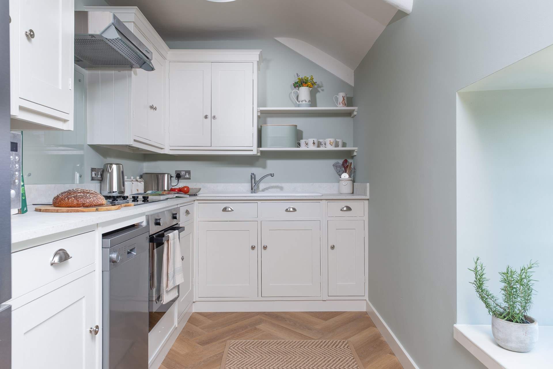 The kitchen is lovely, and has oodles of storage and all the mod-cons. 