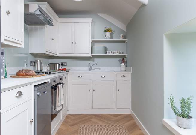 The kitchen is lovely, and has oodles of storage and all mod-cons. 