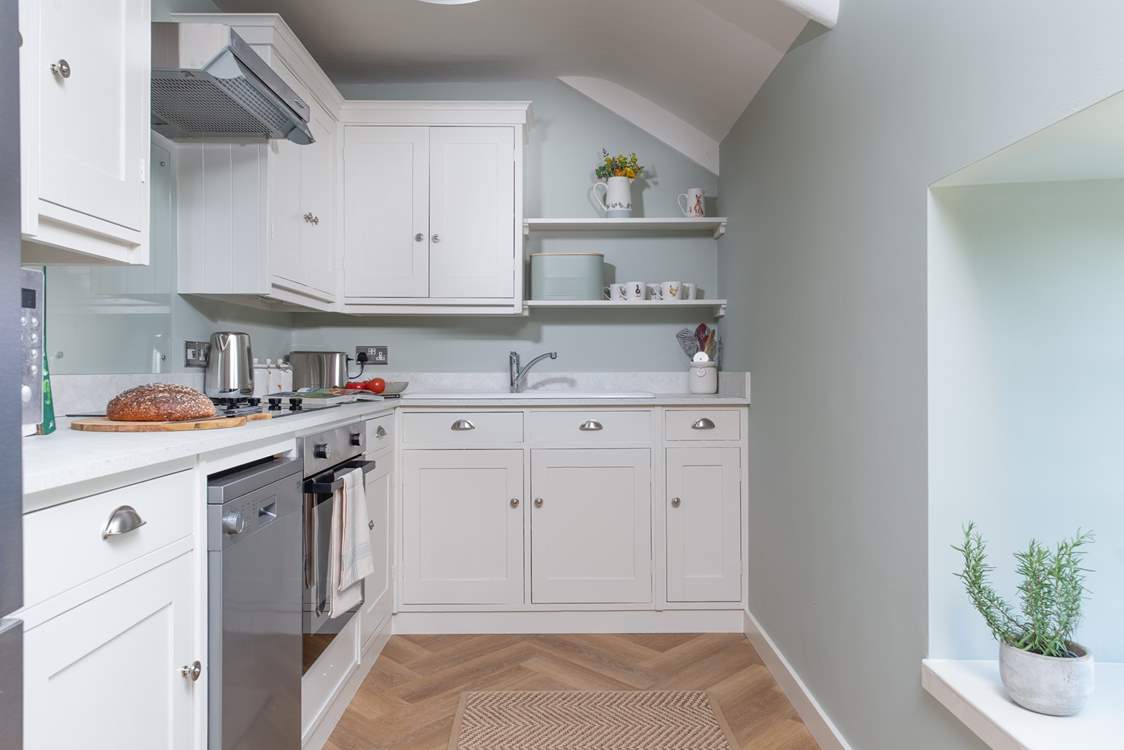 The kitchen is lovely, and has oodles of storage and all the mod-cons.