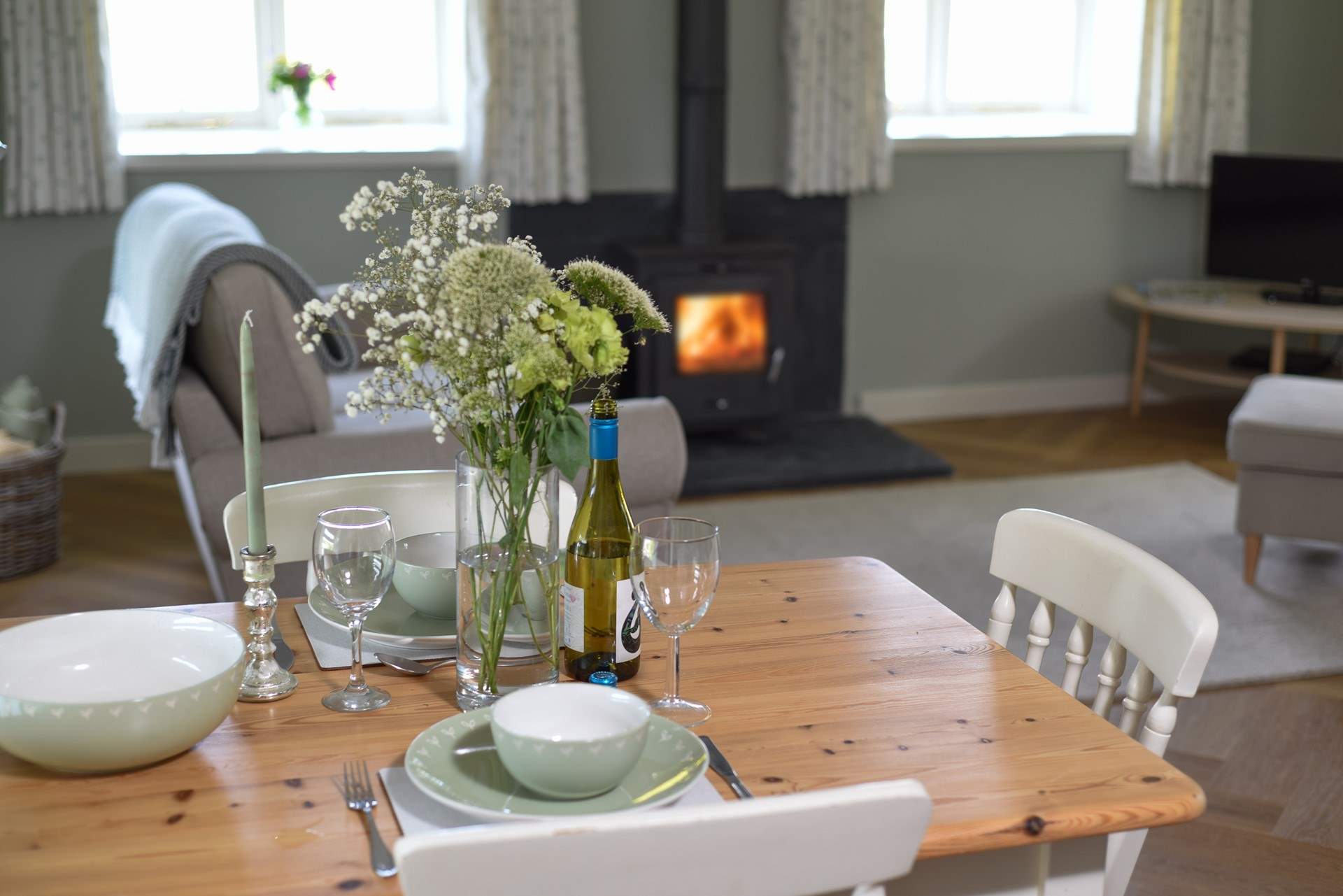 The open plan living space is light, and the perfect spot for a lazy lunch.