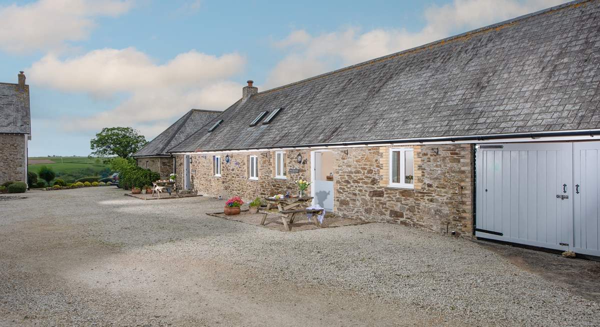 The Granary sits next door to The Long Barn, with separate outside areas.