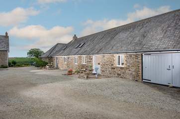 The Granary sits next door to The Long Barn, with separate outside areas.