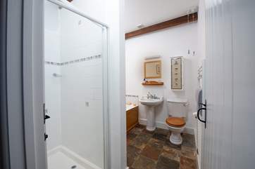 The bathroom has a bath and shower cubicle so you can choose between a long soak or a refreshing shower.