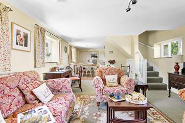 The open plan ground floor has a cosy sitting-area.