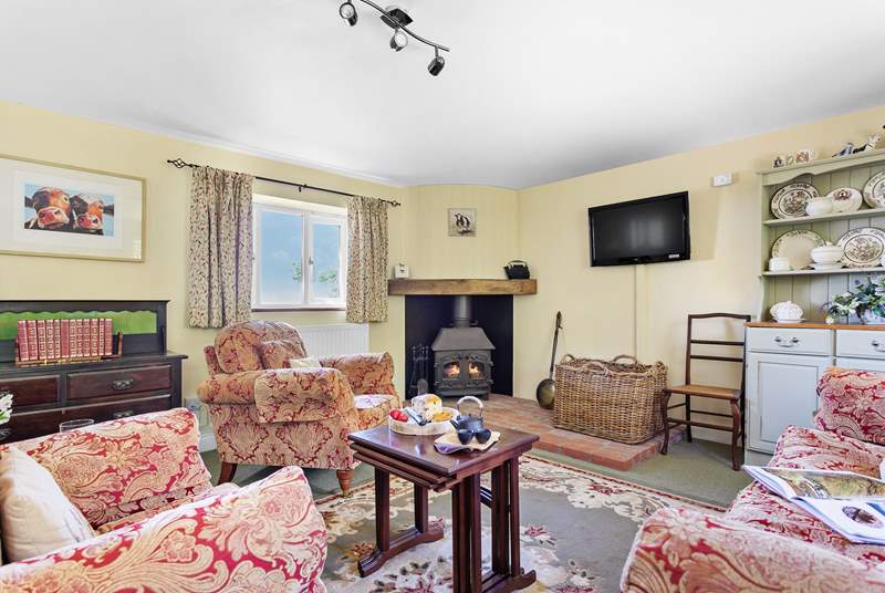 The ground floor is open plan with a cosy and welcoming sitting-area.