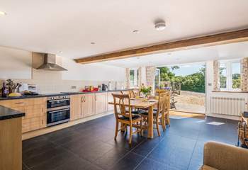 The kitchen/dining area is so light and airy.