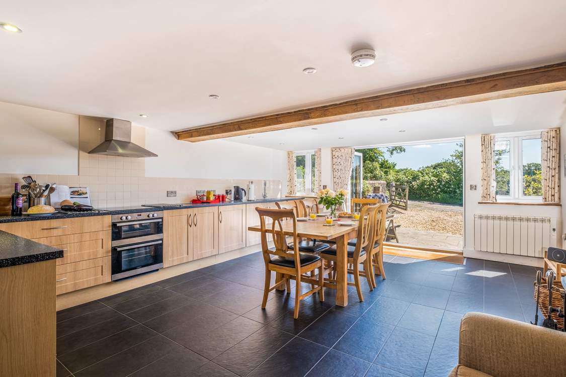The kitchen/dining area is so light and airy.