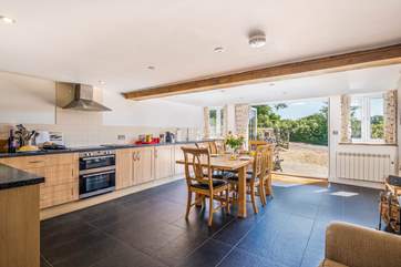 The kitchen/dining area is so light and airy.