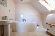 The main bedroom has an en suite bathroom.