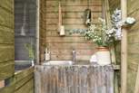 The rustic handcrafted sink.