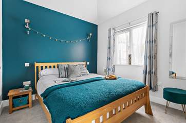 Unwind on the luxurious king-size bed.