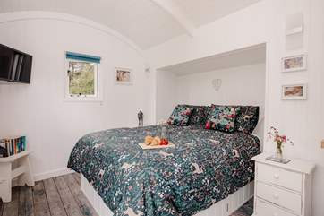 The comfy king-size bed and soft linen promises a restful night's sleep.