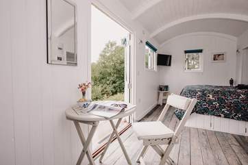 Natural light and fresh air flows effortlessly through the double doors.